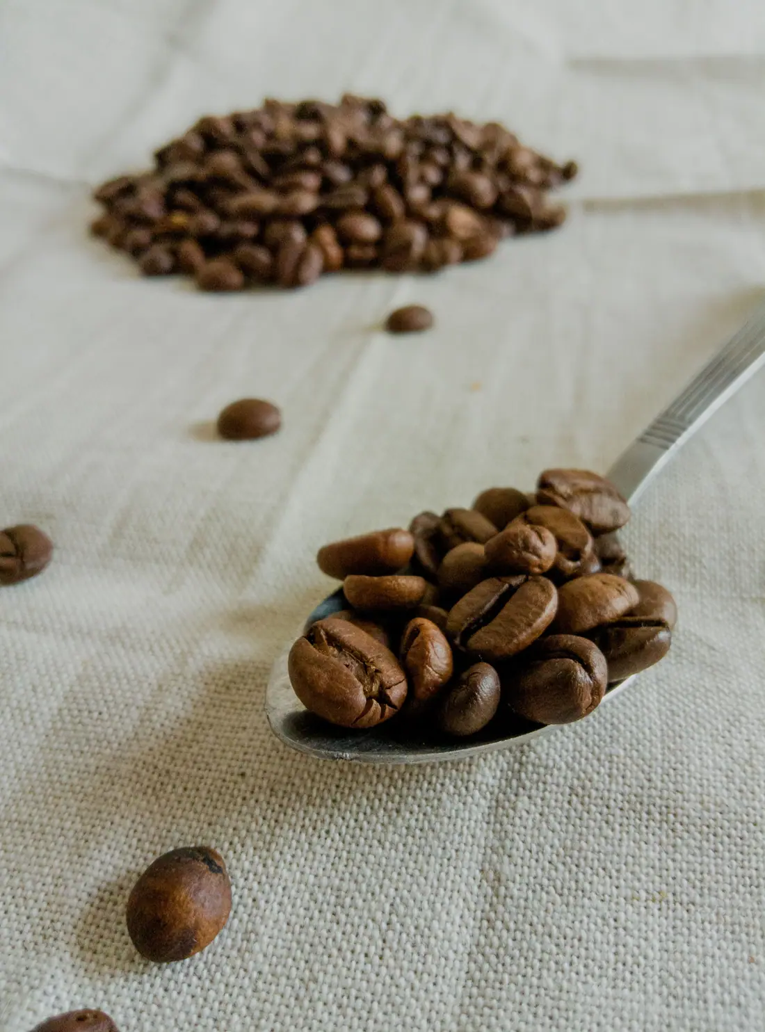 Coffee beans on a spoon